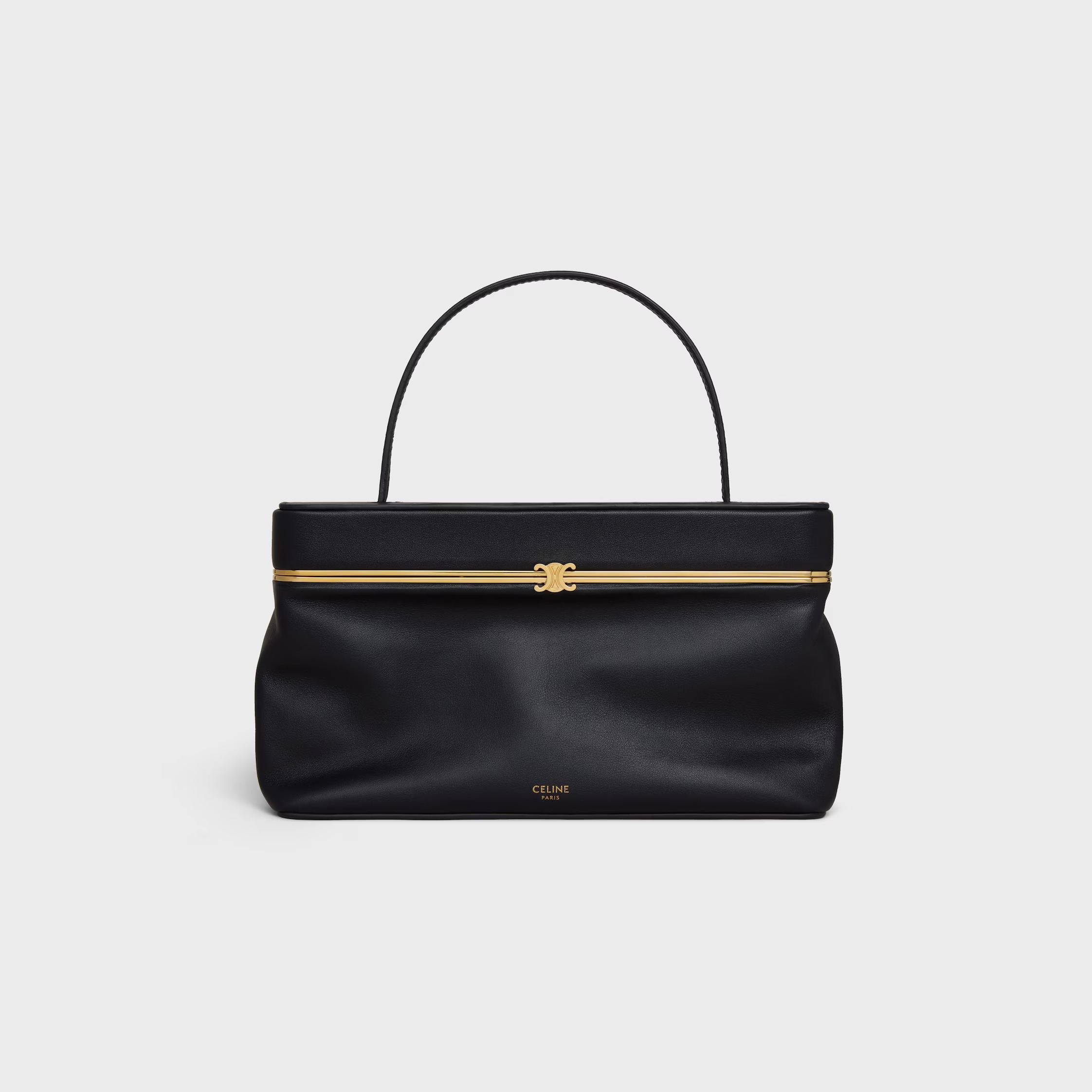 Celine, East West Trimphe cabeza en pantorrillas